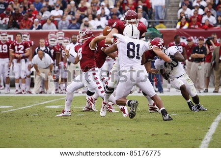 PHILADELPHIA, PA. - SEPTEMBER 17: Temple Quarterback Mike Gerardi is pressured by Penn State\'s #81Jack Crawford during a game on September 17, 2011 at Lincoln Financial Field in Philadelphia, PA.
