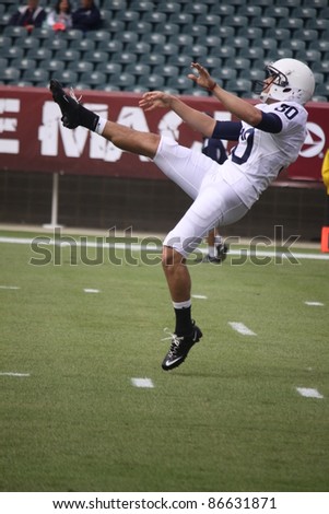 PHILADELPHIA, PA. - SEPTEMBER 17: Penn State punter #30 Anthony Fera follows through on a punt during agame with  Temple on September 17, 2011 at Lincoln Financial Field in Philadelphia, PA.