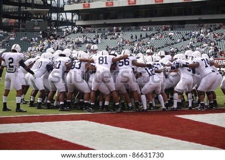 PHILADELPHIA, PA. - SEPTEMBER 17: Penn State players circle and get psyched up before a game with  Temple on September 17, 2011 at Lincoln Financial Field in Philadelphia, PA.