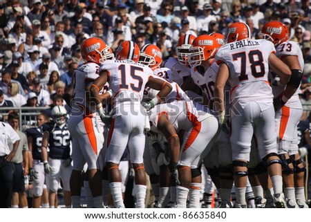 UNIVERSITY PARK, PA - OCT 9: Illinois quarterback No. 2, Nathan Scheelhaase calls out the in the huddle during a game against Penn State at Beaver Stadium on October 9, 2010 in University Park, PA