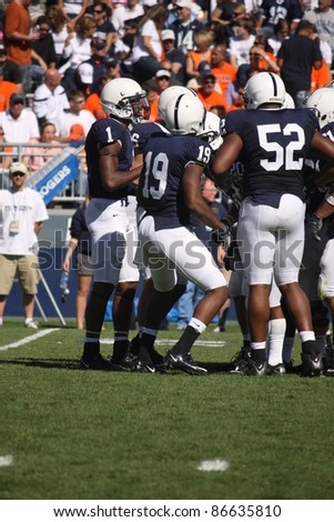 UNIVERSITY PARK, PA - OCT 9: Penn State quarterback Robert Bolden calls the play in the huddle during a game with Illinois at Beaver Stadium on October 9, 2010 in University Park, PA