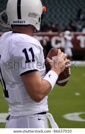 PHILADELPHIA, PA. - SEPTEMBER 17: Penn State quarterback Matthew McGloin warms up before a game against Temple on September 17, 2011 at Lincoln Financial Field in Philadelphia, PA.