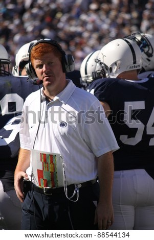 UNIVERSITY PARK, PA - OCT 9: Penn State coach Mike McQueary looks away after speaking to the players during a loss to Illinois at Beaver Stadium October 9, 2010 in University Park, PA