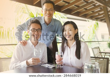 Asian business team in the restaurant