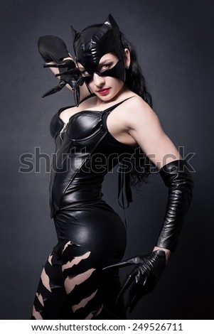 attractive woman in leather latex cat costume