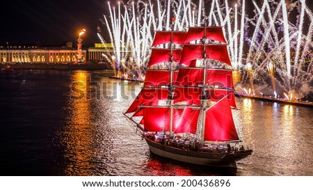 ST.PETERSBURG, RUSSIA - JUN 20, 2014: Light show and firework with a frigate with scarlet sails floating on the Neva River JUN 20, 2014 ST.PETERSBURG, RUSSIA