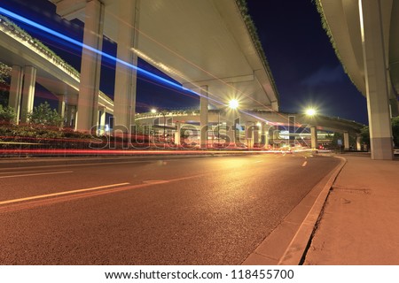 light trails under city highway viaduct in shanghai,China