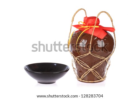 rice wine jar with ceramic bowl on white background