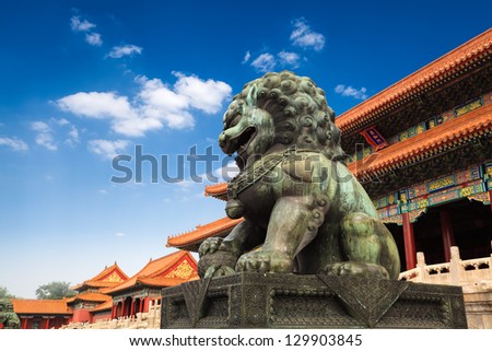 bronze lion in front of the hall of supreme harmony in beijing forbidden city, China