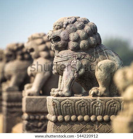 ancient stone lion on beijing marco polo bridge