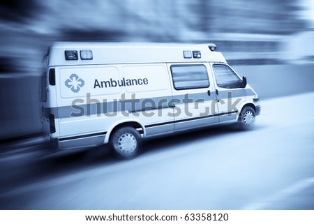 ambulance speeding with blurred motion