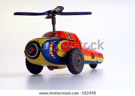 Clockwork tin toy helicopter.