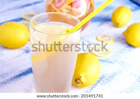 Refreshing Homemade Ice Cold Strawberry Lemonade with ginger and lemons
