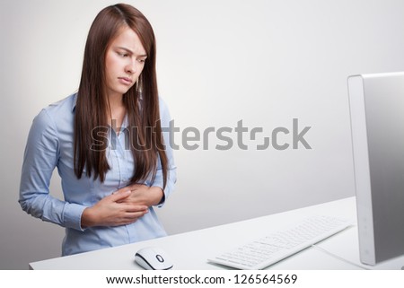 Woman massaging pain stomach