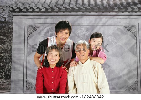 old couple with young boy and girl