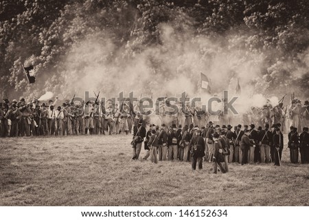 GETTYSBURG, PENNSYLVANIA - JULY 5: Reenactment of the Battle of the Wheatfield at the 150th anniversary of the Gettysburg Civil War battles on July 5, 2013 in Gettysburg, Pennsylvania