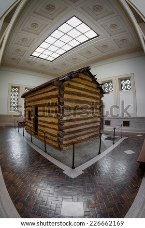 HODGENVILLE, KENTUCKY - OCT 21: Log cabin inside the first Lincoln Memorial building at Abraham Lincoln Birthplace National Historical Park on October 21, 2014 in Hodgenville, Kentucky