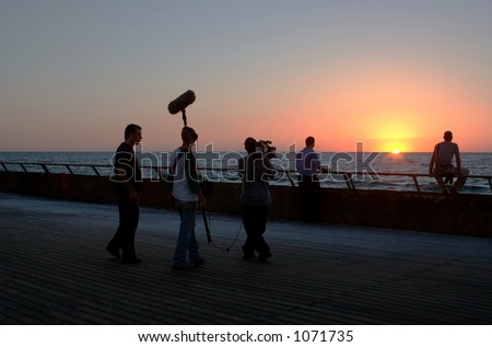 TV crew at sunset