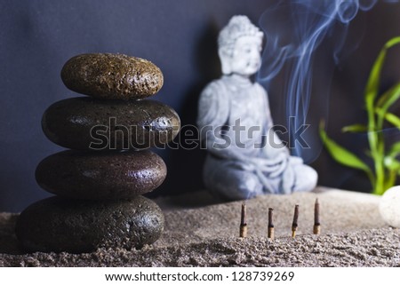 four stone tower and stone sitting buddha, wich frankincense