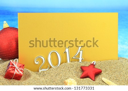 New year 2014 card on the beach