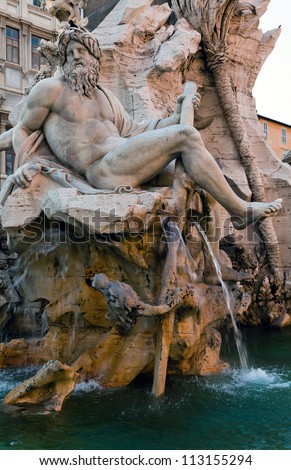 Symbolic river Ganges figure at the Fontana dei Quattro Fiumi in the centre of Piazza Navona, Rome. The fountain was designed by Bernini and unveiled in 1651.