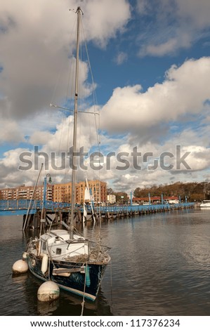 BROOKLYN, NEW YORK - OCTOBER 30: The damaged yacht in the aftermath of the Superstorm Sandy on October 30, 2012 in the Sheepshead Bay, Brooklyn, New York, USA.