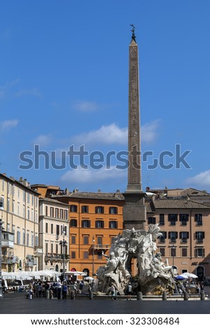 ROME, ITALY - JULY 30 2015: Fountain of the Four Rivers in the Piazza Navona, designed in 1651 by Gian Lorenzo Bernini. The four figures represent the Ganges, the Plate, the Danube and the Nile.