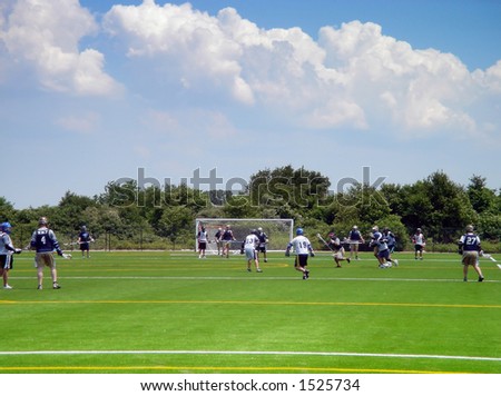 Lacrosse players in action on the Floyd Bennet field in Brooklyn, New York