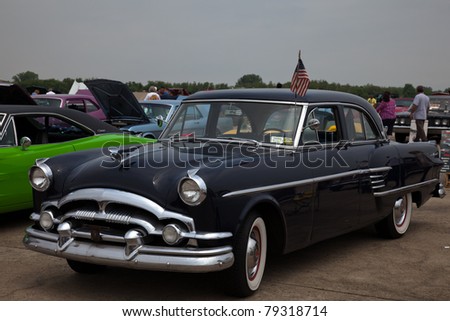 BROOKLYN, NEW YORK - JUNE 12: A 1954 Packard Pacific Hardtop at the Antique Automobile Association of Brooklyn Dust Off Car Show on June 12, 2011 at Floyd Bennett Field in Brooklyn, New York, USA.
