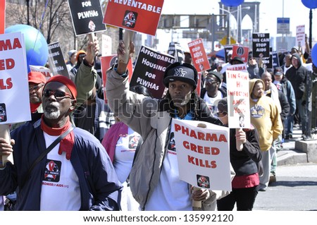 MANHATTAN, NEW YORK - APRIL 6: Hundreds of demonstrators march in an AIDS walk to raise awareness and promote government funding for AIDS research and care on April 6, 2013 in New York City