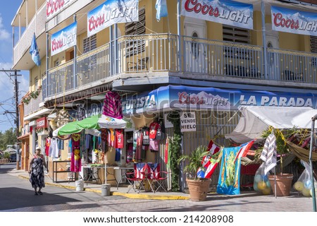 BOQUERON, PUERTO RICO, USA - JANUARY 17, 2014: Tourist shop on corner of brick street in Boqueron on west coast of Puerto Rico offers colorful variety of souvenirs for tourists.
