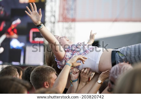 Budapest, Hungary - August 10th 2010: A young adult female crowd surfing at the Sziget Festival