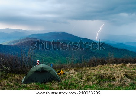 Heavy storm with thunders and lightnings hit the wild campers in Bieszczady mountains on the Slovak - Polish - Ukrainian borders