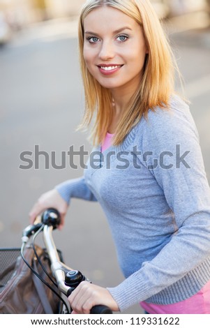 Young woman on bike