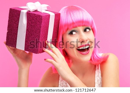 Young happy woman with gift