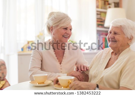 Similar – Image, Stock Photo Senior woman spending quality time with her daughter