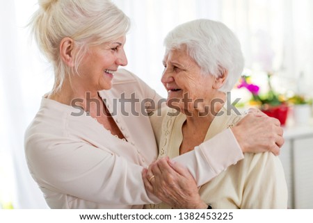 Similar – Image, Stock Photo Senior woman spending quality time with her daughter