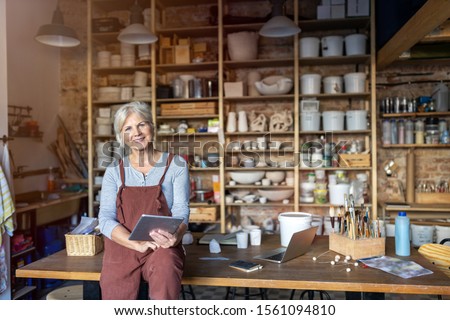 Image, Stock Photo Senior craftswoman in art studio