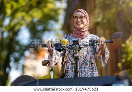 Similar – Image, Stock Photo Woman using cargo bike in urban area