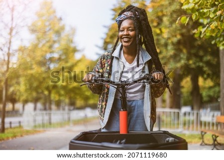 Similar – Image, Stock Photo Woman using cargo bike in urban area