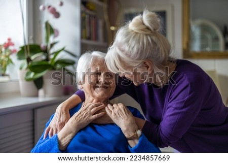 Image, Stock Photo Woman hugging her elderly mother