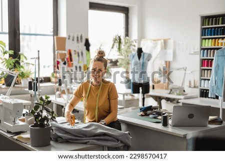 Similar – Image, Stock Photo Fashion designer woman