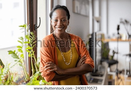 Image, Stock Photo African American woman standing near white wall