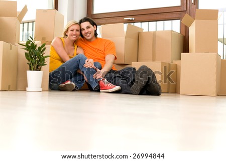 Couple sitting in new home