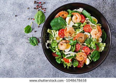 Similar – Image, Stock Photo Spinach salad with eggs avocados tomatoes and mozzarella cheese