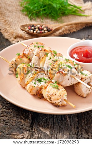 grilled chicken on bamboo skewers