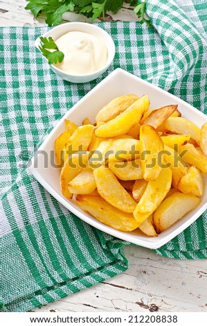 Fried potato wedges