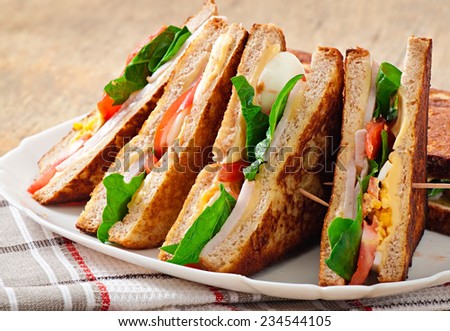 Club sandwich with chicken and ham
