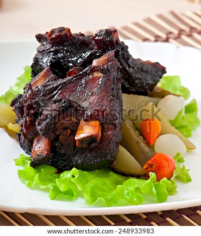 Baked beef ribs in honey soy marinade with pickled vegetables
