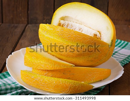 Melon cut into pieces on a plate